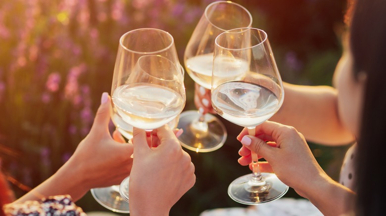 wine glasses clinking