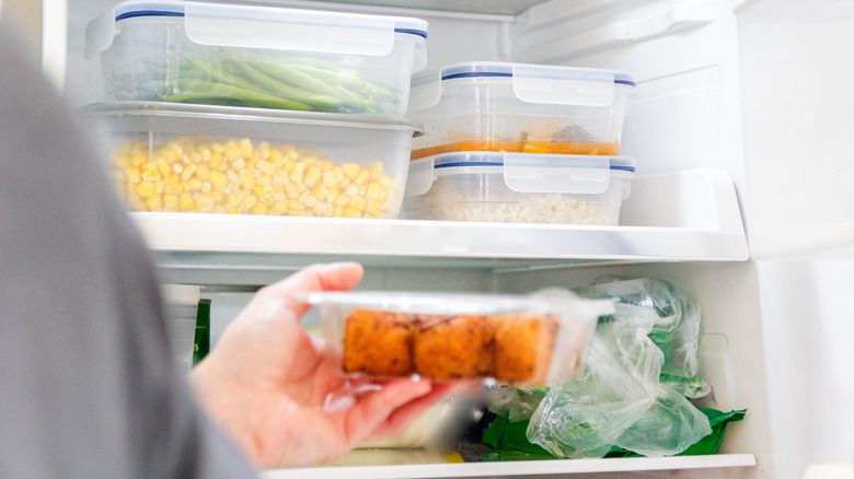Food stored in containers in a fridge.