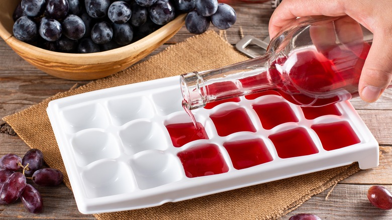 pouring wine in ice tray