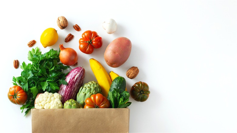 Brown bag with spilled produce 