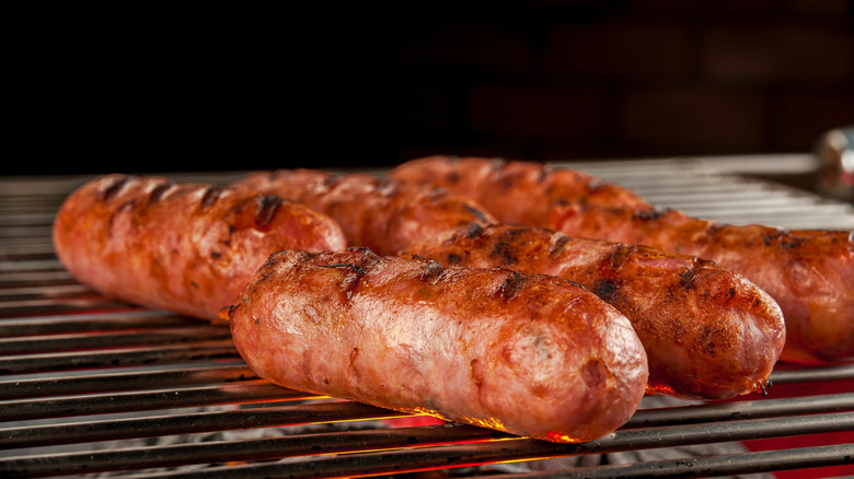 Linguiça sausages on a grill