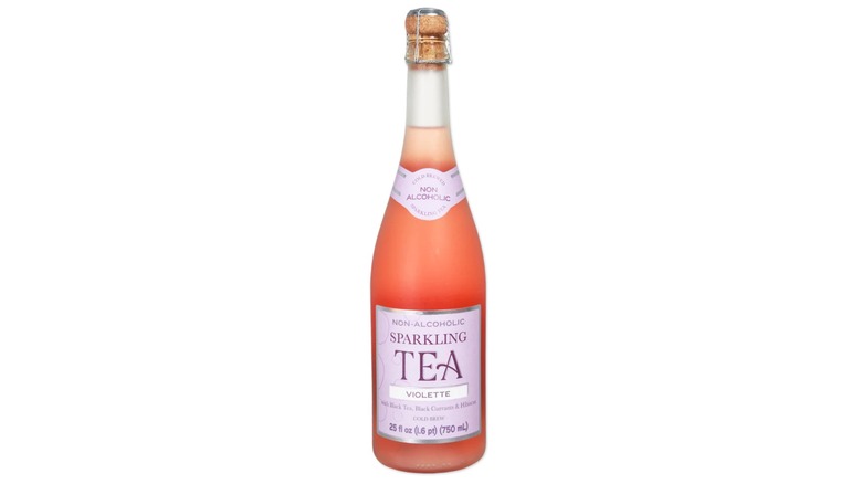 A pink bottle of Trader Joe's non-alcoholic sparkling violette tea