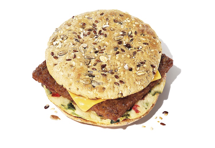 Power Breakfast Sandwich at Dunkin' with a veggie egg white omelet, turkey sausage, cheddar cheese, multigrain thin bread, 420 calories, and 25 grams of protein as one of the healthiest food choices at Dunkin'